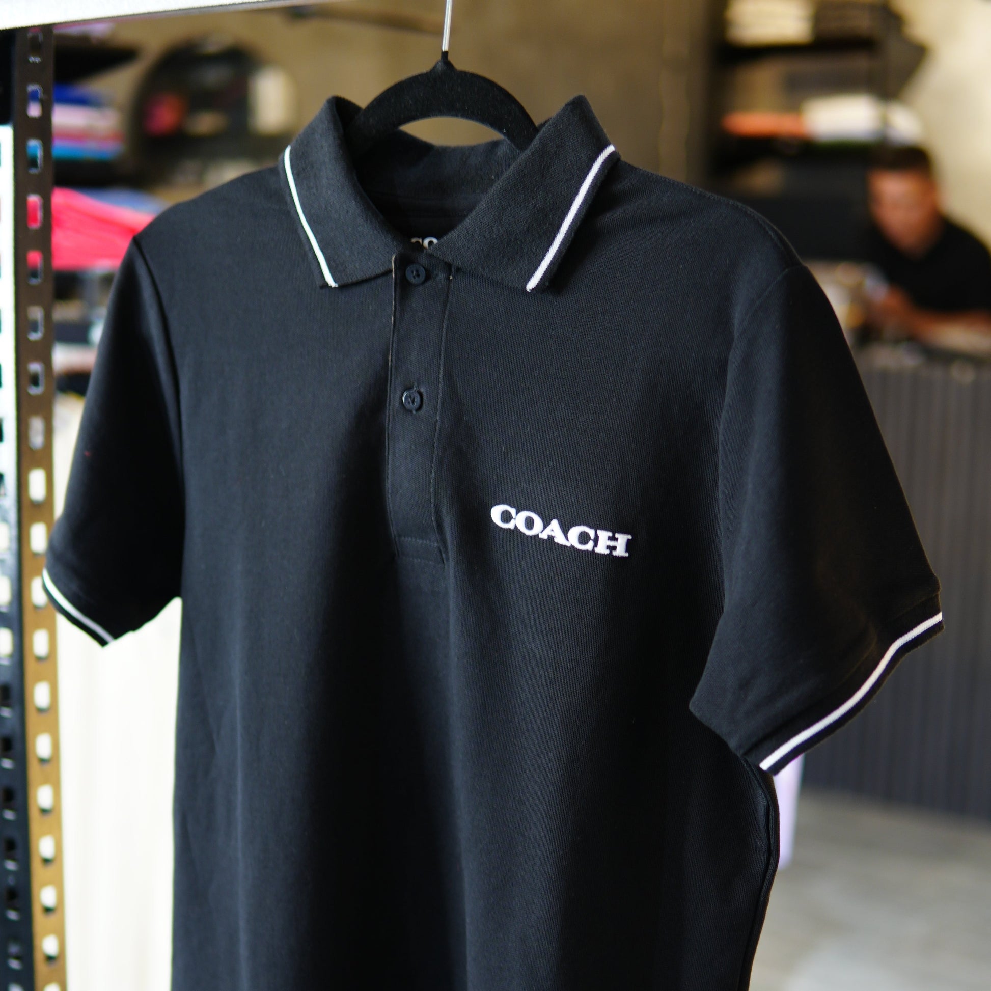 Coach Tipo Polo