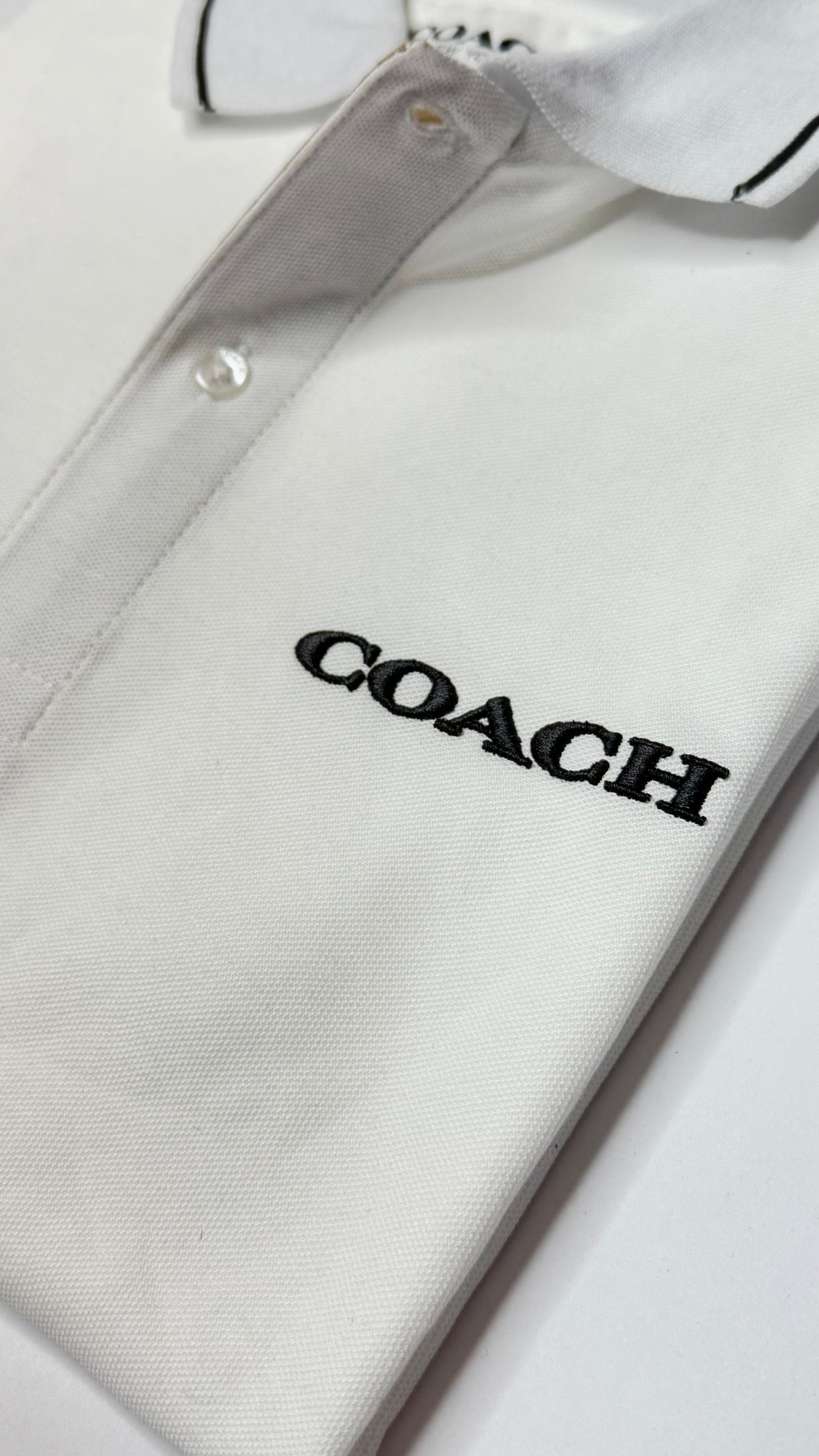 Coach Tipo Polo